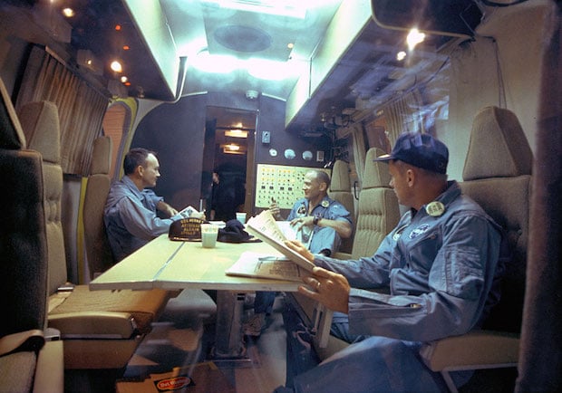 The Apollo 11 crew relaxes in the quarantine van.