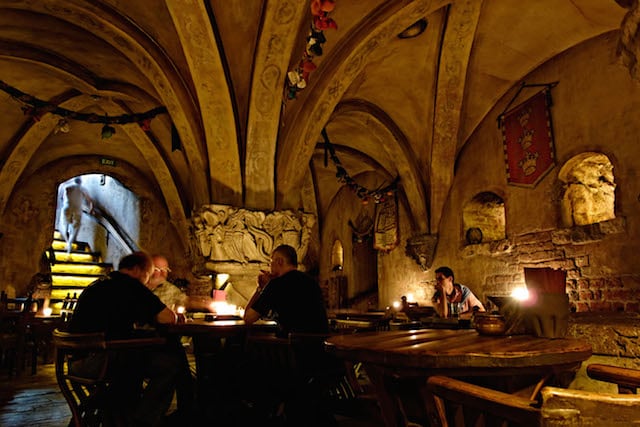 A small camera and tripod allowed me to take this image of the interior of a Medieval restaurant without drawing undue attention to what I was doing. Photo ©Mike Randolph
