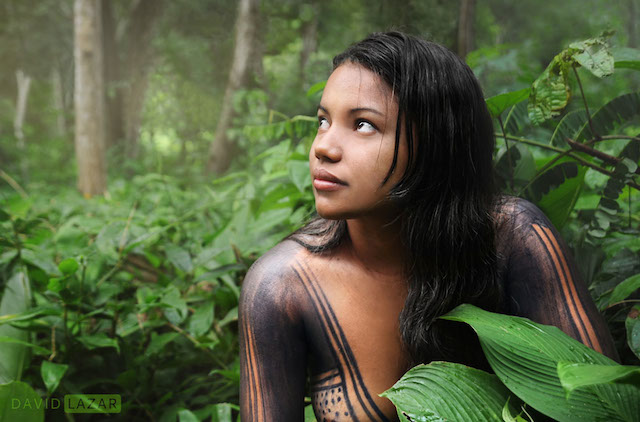 Taken while staying in an indigenous community in Maraba, Brazil, the young lady is leaning on her knee.