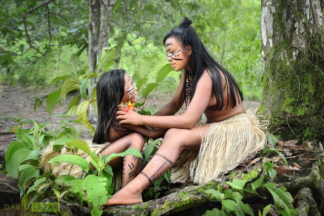 Members of the Dessana tribe near Manaus, Brazil, interacting with each other’s accessories and hair