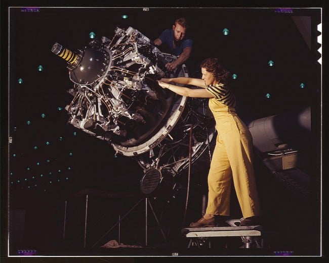 A woman is trained to work on an engine installation at the Douglas Aircraft Company, 1942.
