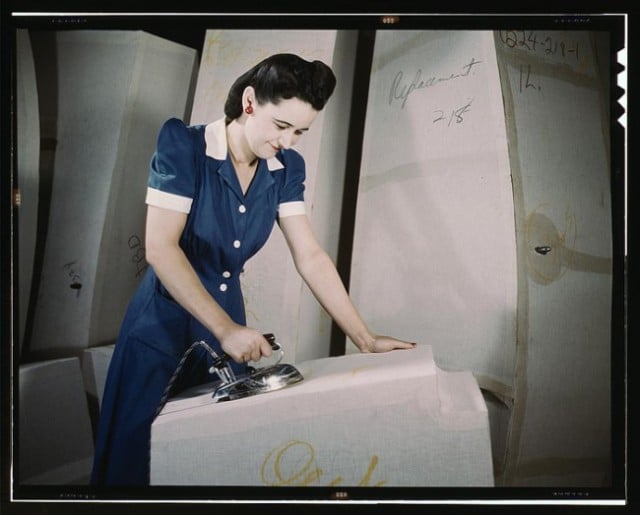 A woman working on self-sealing gas tanks at Goodyear Tire and Rubber Co. in Ohio, 1941.