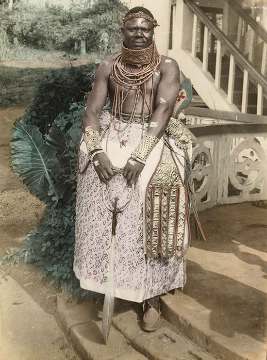Solomon Osagie Alonge, “Portrait of Chief Francis Edo Osagie” (1960), Benin City, Silver gelatin print with hand-coloring (Chief S. O. Alonge Collection, Eliot Elisofon Photographic Archives)