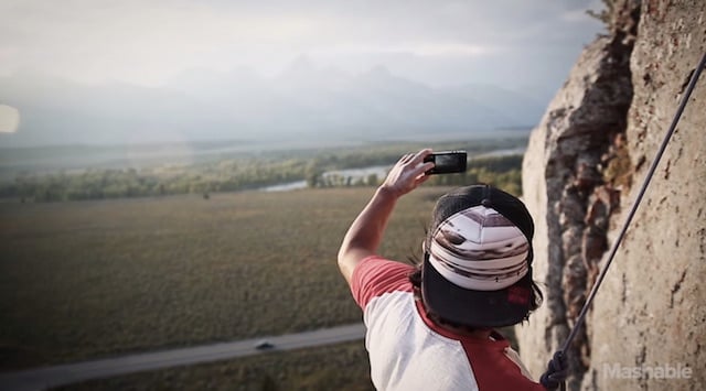 DSLR around his waist, even Chin occasionally pulls out his cell phone instead.