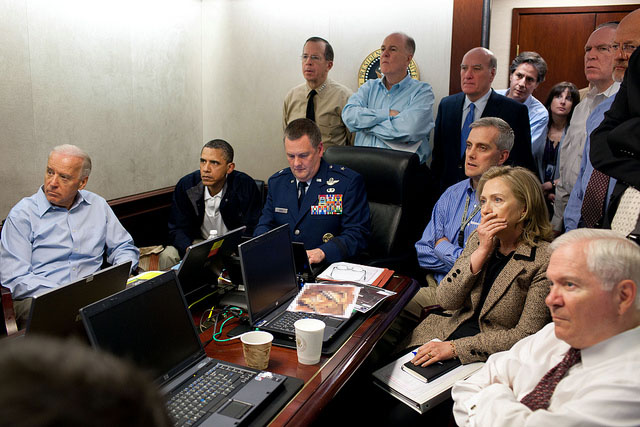 President Barack Obama and Vice President Joe Biden, along with members of the national security team, receive an update on the mission against Osama bin Laden in the Situation Room of the White House, May 1, 2011. [#]