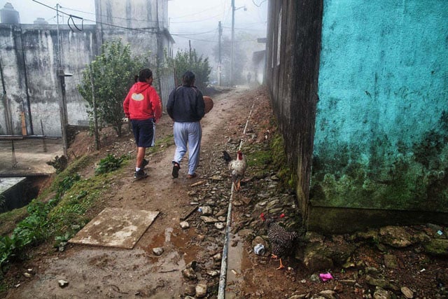 Two members of San Juan Metaltepec's female team "Las Abejitas" on their way to the tournament.