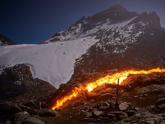 The flame line shows the Lewis Glacier's location in 1934. It has since receded about 200m.