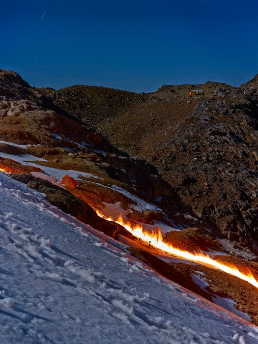 The flame line shows the Lewis Glacier's location in 2013. In the intervening time the glacier has receded further.