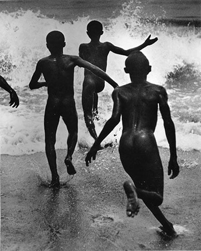 "Three Boys at Lake Tanganyika" by Martin Munkácsi