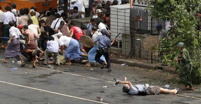Kenji Nagai of APF lies dying after police and military officials fired on him in Yangon, September 27, 2007. Adrees Latif.