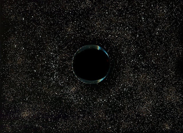 A black hole created with sugar, cinnamon, flour, and a glass of coffee.