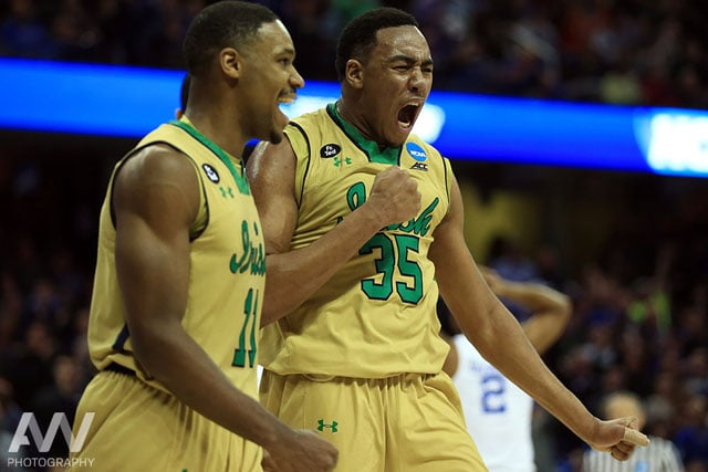 Notre Dame Fighting Irish forward Bonzie Colson (35) reacts with guard Demetrius Jackson (11) during the first half against the Kentucky Wildcats in the finals of the midwest regional of the 2015 NCAA Tournament at Quicken Loans Arena.