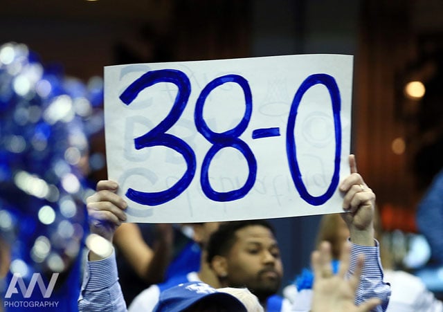 Kentucky Wildcats fans hold up a sign after the game against the Notre Dame Fighting Irish in the finals of the midwest regional of the 2015 NCAA Tournament at Quicken Loans Arena. Kentucky won 68-66.