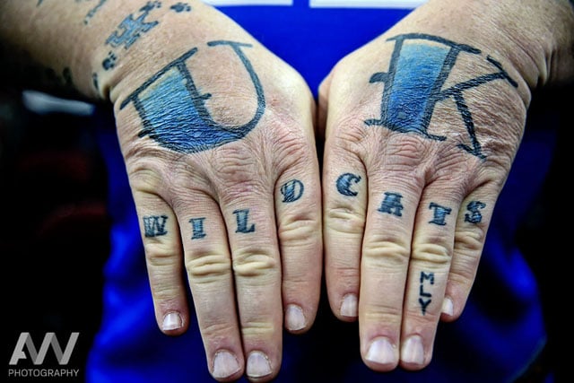 Kentucky Wildcats fan Thomas Younce shows off his tattoos prior to the game against the Notre Dame Fighting Irish in the finals of the midwest regional of the 2015 NCAA Tournament at Quicken Loans Arena.