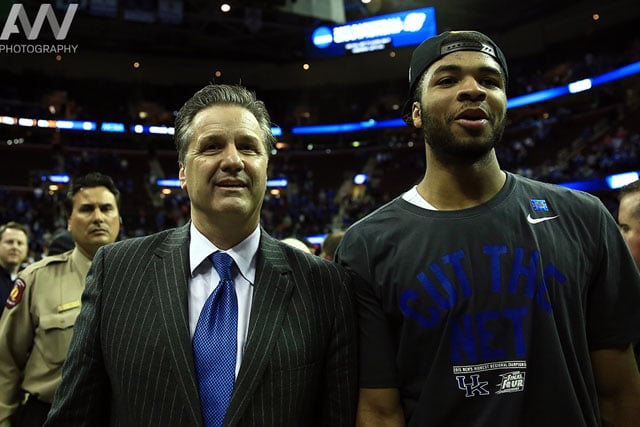 Kentucky Wildcats head coach John Calipari and guard Andrew Harrison (right) walk off the court after the game against the Notre Dame Fighting Irish in the finals of the midwest regional of the 2015 NCAA Tournament at Quicken Loans Arena. Kentucky won 68-66.