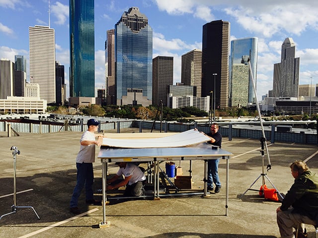 Our crew setting up the plexiglas stage on the rooftop parking garage.