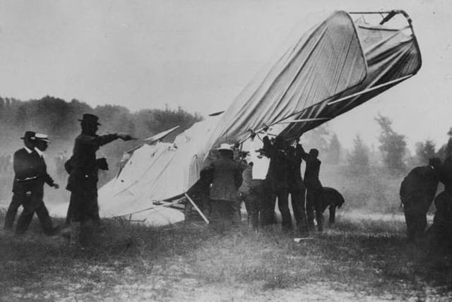 A black and white photograph of a fatal plane crash