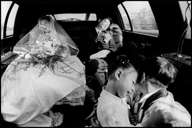 TAIWAN. Taichung. 1997. A newlywed couple and flower children.