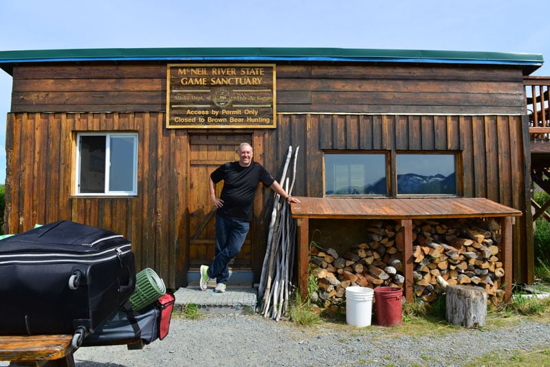 A picture of me at the “Cook Shack," the only enclosed structure (other than the outhouses) that the campers can go into.  For safety, all food is stored in there and that is where all meals are cooked and eaten.