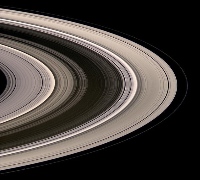 Saturn's rings glowing in scattered sunlight. [#]