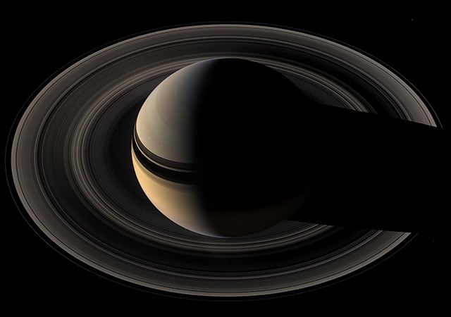 Saturn casting a shadow on its rings. [#]