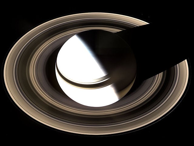 Saturn overexposed to bring out details in its rings. [#]