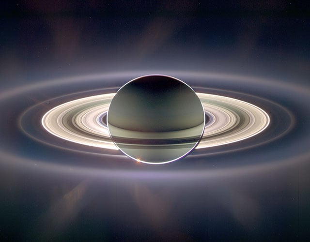 Saturn passing in front of the Sun. A color-exaggerated image that combines 165 images taken over 3 hours.