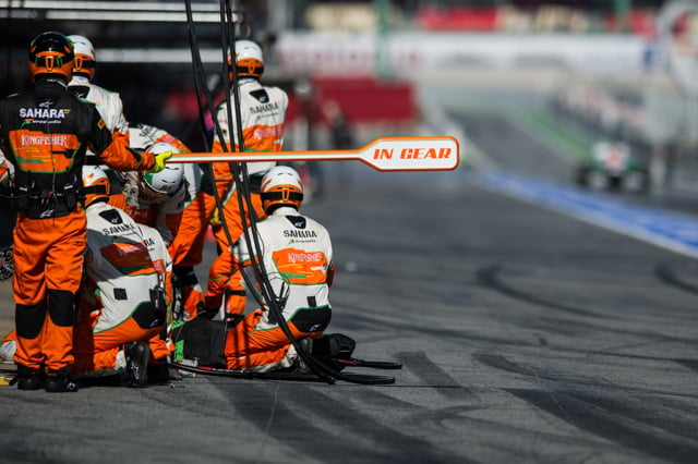 Force India does full gear practice pitstops during Barcelona pre-season testing during February 2013.
