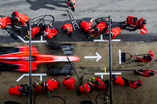 Marussia Formula One team practice a pitstop with new rookie driver Max Chilton at Circuit de Catalunya during pre-season February testing 2013.