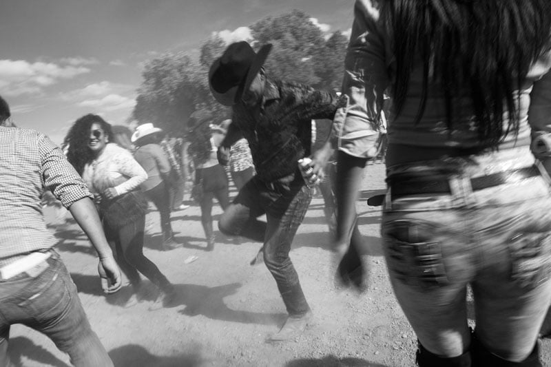 Kicking up more dust than the bulls: dancing at the Rodeo Caliente. Apal Singh/Photographers for Hope