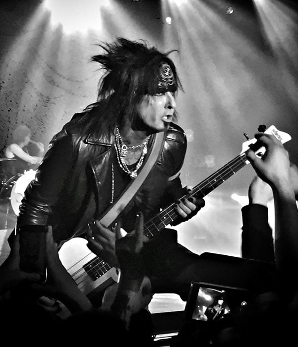 Nikki Sixx on tour with Six AM. I was about 15 feet back and did cropped in post. The colors were awful as most <a href=