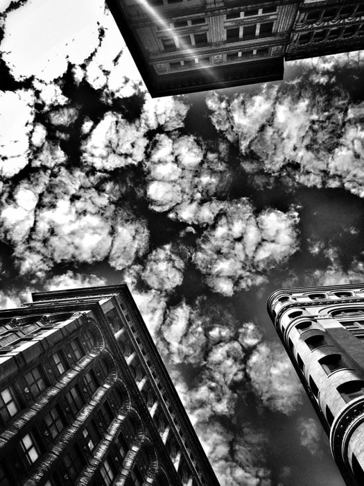 This shot was taken while I was at a stop light sitting on my Vespa. I looked up and the drama of the clouds struck me. I slipped the phone out of my pocket pointed it straight up and make this shot. It looked good in color, but the B&W was more dramatic.
