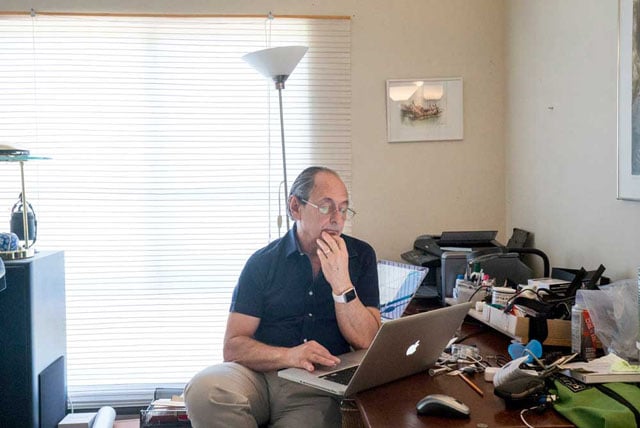 Nobel Prize-winning Professor Michael Levitt works in his home office on the Stanford campus.