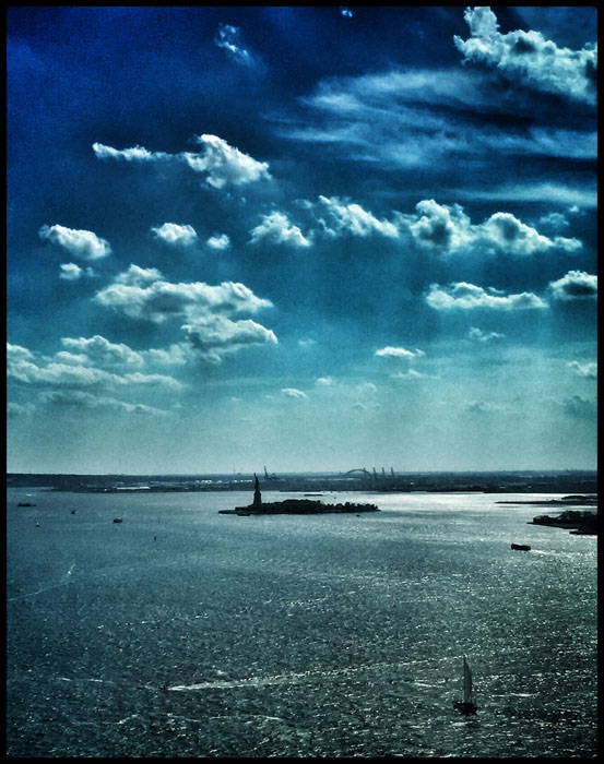 NY Harbor from a tall building in Battery Park. the Drama filter in Snapseed just really brings out the rays of light and clouds.