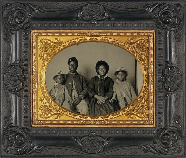 This is the only known photograph of an African American Union soldier with his family.