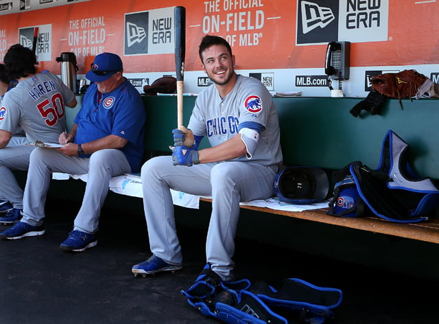 Kris Bryant #17 of the Chicago Cubs gets ready in the dugout before the game against the San Francisco Giants at AT&T Park on Thursday, August 27, 2015 in San Francisco, California. Photo by Brad Mangin.