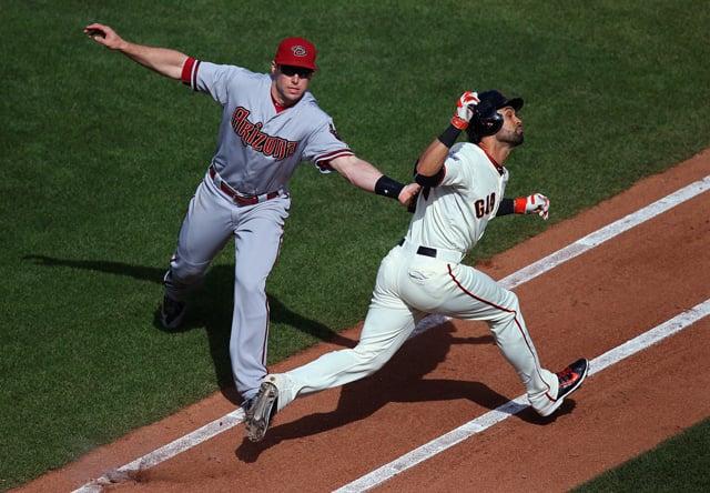 Paul Goldschmidt #44 of the Arizona Diamondbacks tags out San Francisco Giants base runner Angel Pagan #16 along the first base line during the game at AT&T Park on Saturday, June 13, 2015 in San Francisco, California. Photo by Brad Mangin.