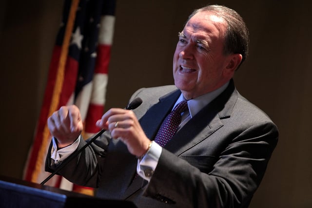 Former Governor Mike Huckabee of Arkansas speaking with supporters at a fundraiser at the Phoenix Country Club in Phoenix, Arizona.