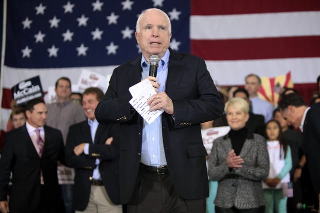 U.S. Senator John McCain speaking with supporters at a campaign rally, along with former Governor Mitt Romney, at Dobson High School in Mesa, Arizona.
