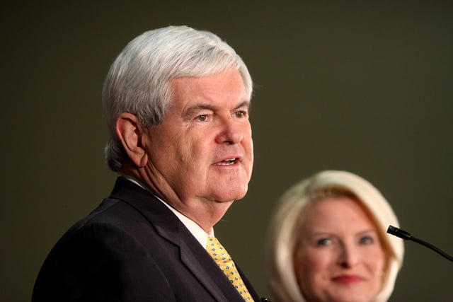 Newt Gingrich speaking to supporters at a townhall in Derry, New Hampshire, along with his wife, Callista.