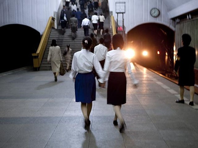 The subway system in Pyongyang is deep underground and doubles as a bomb shelter. Lafforgue was asked to delete this photo because it contains the tunnel.