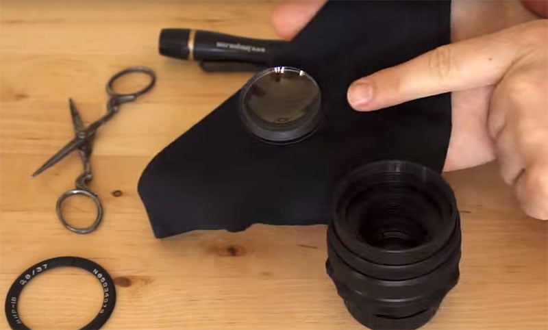 Flip this front element and reinstall it in the lens.