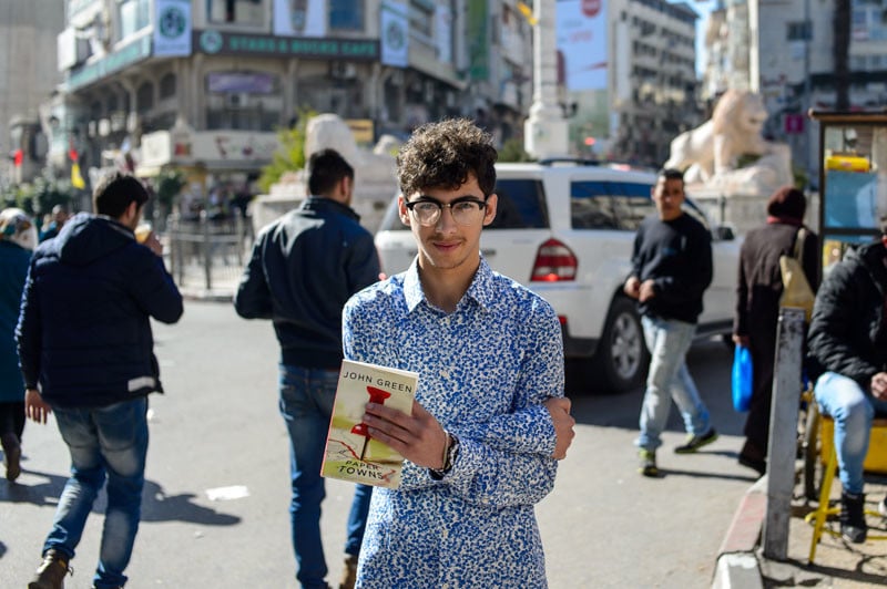 Tay, 16 years old student at American School of Palestine who loves to wander around Ramallah while reading books.