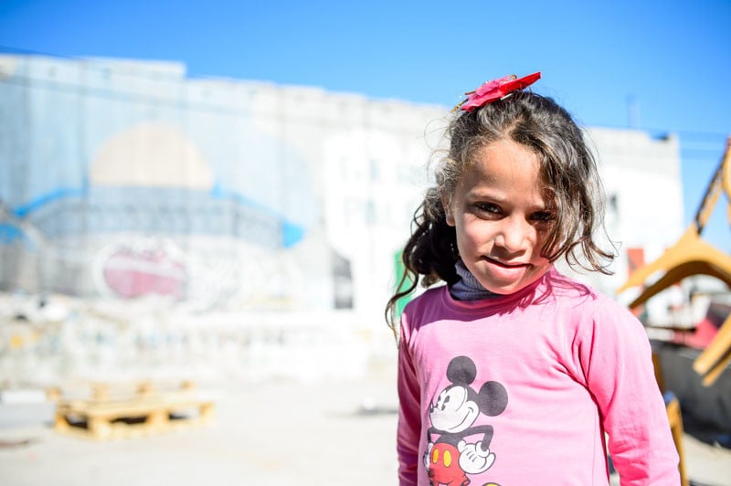 Reem, 7 years old born and raised in the camp living 30 meters away from the wall.