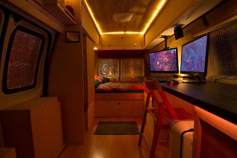 Photographer Turns NYPD Surveillance Van Into Home and Editing Studio