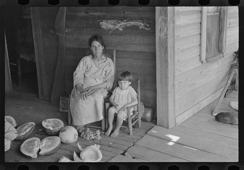 Walker Evans, doing the same thing. Notice the little patch of sunlight on the floor, and the woman's hair.