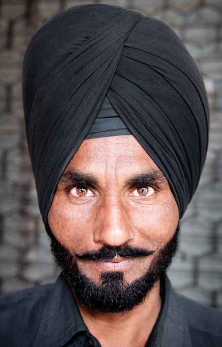 This man’s face and eyes were so compelling that I didn’t need to include anything else in the image to make it have an impact. (Chandigarh, India. 2011.)