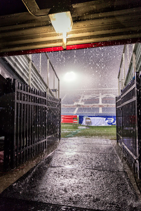 A view from beneath the stands of the heavy downpour.