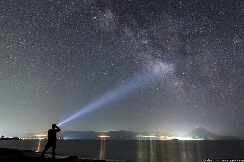 (Selfie) Pointing at the Galactic center of the Milky Way over the town of Pylos in Messinia, Greece