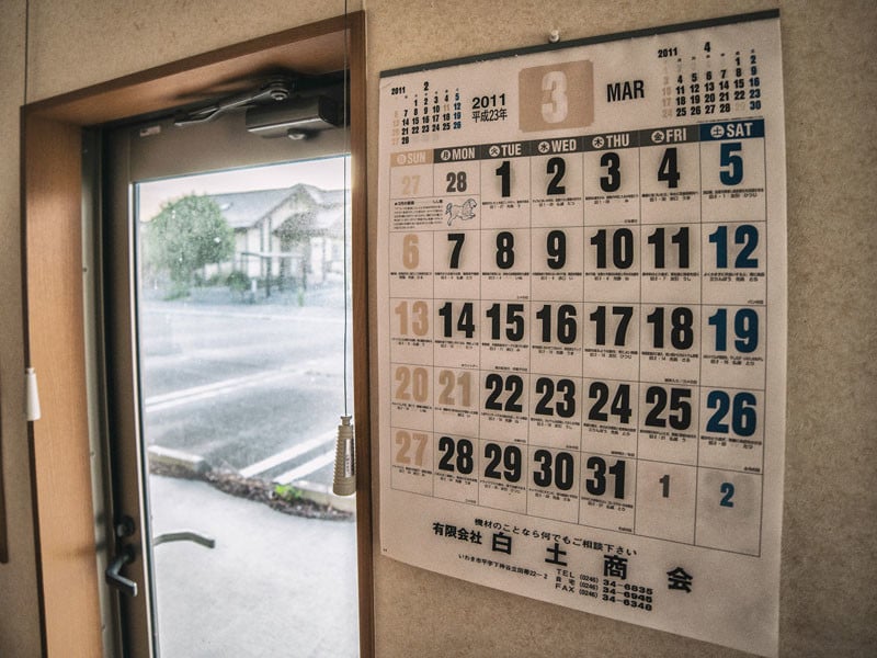 A calendar on a wall reflects how time has stood still since March 2011.